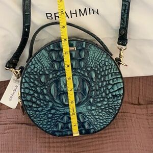 Brahmin Teal Round Crossbody Bag with dust cover.